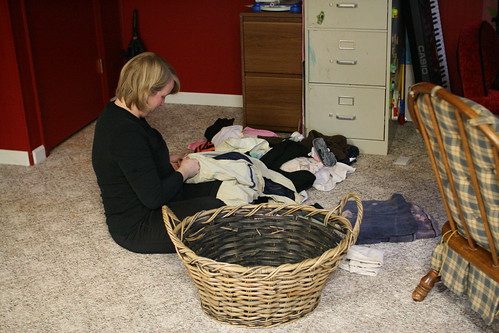 Rachel folding laundry