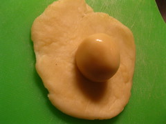 Wrap the oil based dough with the water based dough into a ball