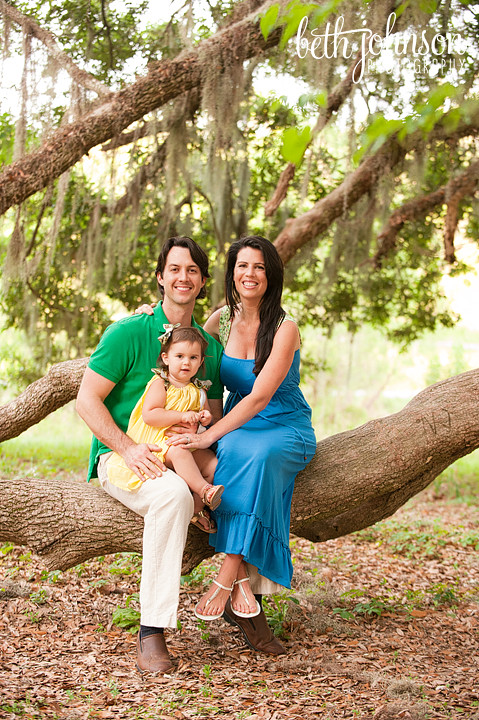 family of three mama daddy baby girl in tree