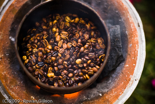 Fresh Ethiopian coffee is roasted over a small charcoal brazier.