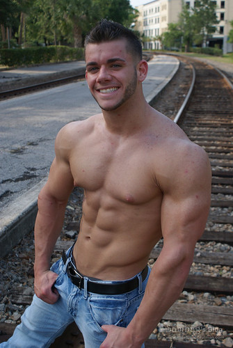 sexy hunk shirtless picture hot muscle man on the train line