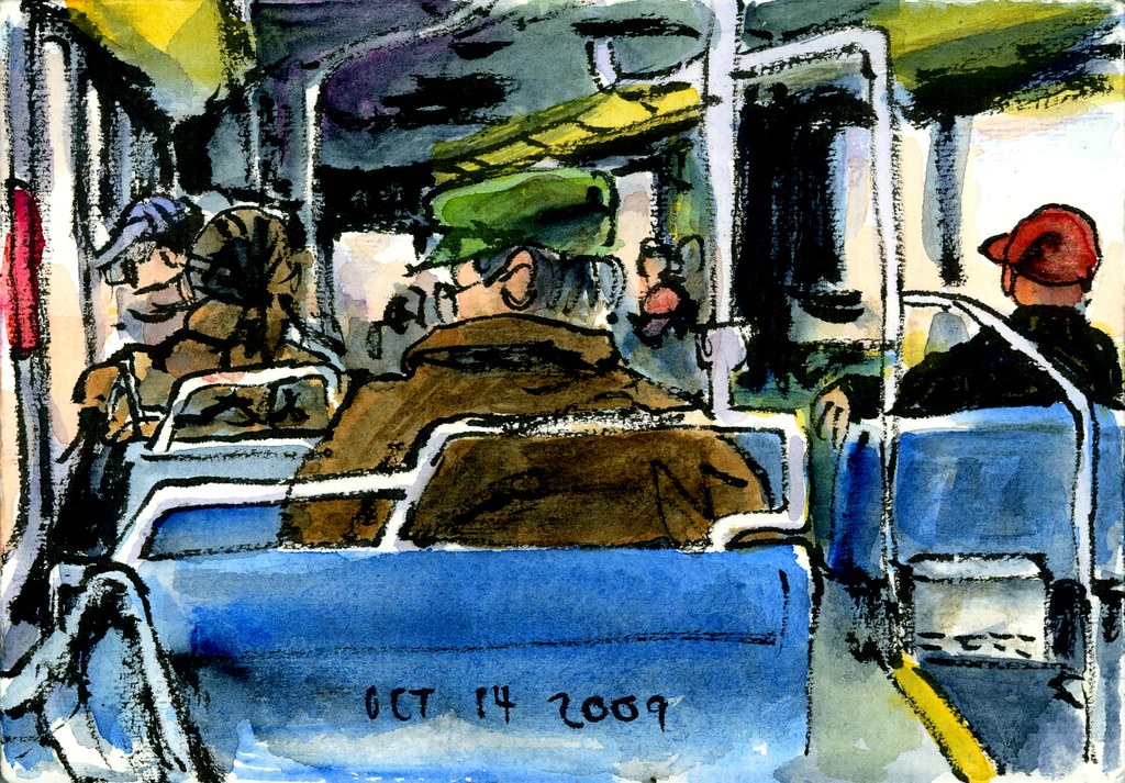 Many people on the bus wear hats