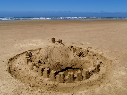 beach sand castle. Sand castle on the ocean each