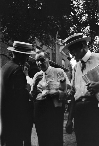 Clarence S. Darrow (center) standing near Rhea County Courthouse with unidentified man (left) and Ar