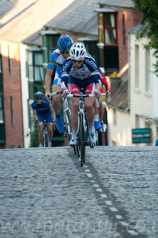 Riders cresting the brow of the steepest section of the tough durham course