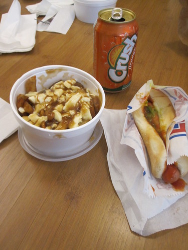 Poutine, hot dog and an orange Crush - $6.59