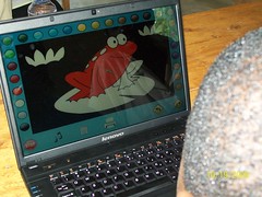 Computer lab, this student is learning to use a mouse with coloring software by Gashora Rwanda