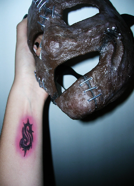 My arm with my future Slipknot tattoo and my mask of Corey Taylor from the 