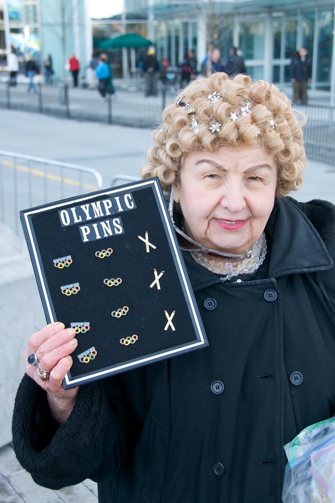Friendly Old Lady Sells Pins Has Heart of Gold