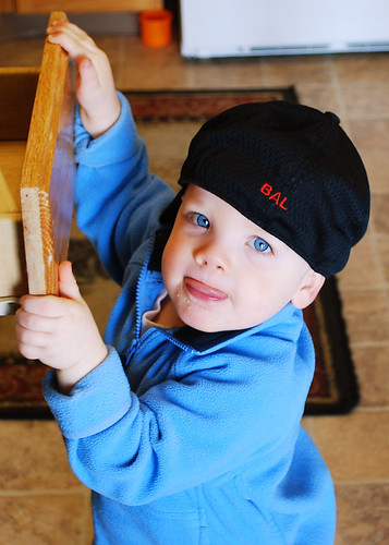 Cutie Boy wearing Daddy's Hat