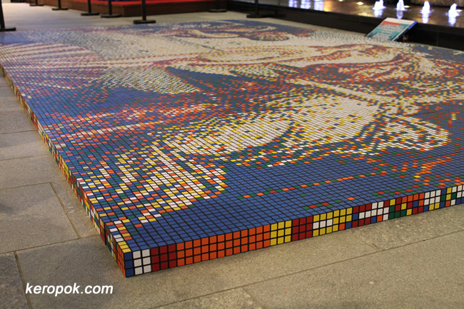 Yes, portrait's arranged with Rubik's Cube