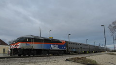 Westbound Metra local departing from Elmwood Park Illinois. Sunday afternoon, March 14th 2010.