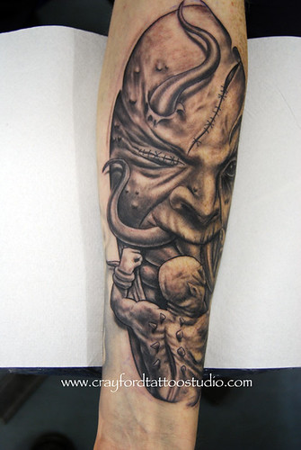Demonic forearm Tattoo Tattooed by Ray