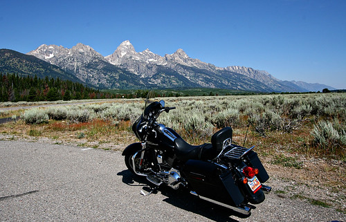 Our rented Harley Street Glide in front of the Grand Tetons.