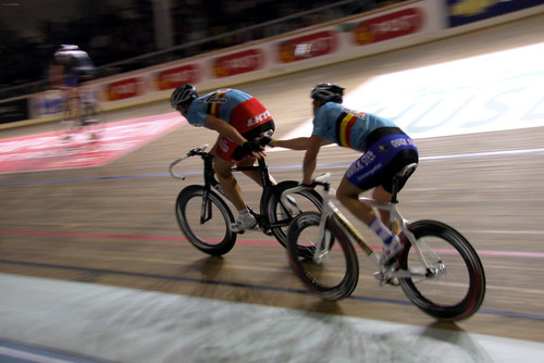 Six Day Race - Men in Tight Pants Holding Hands