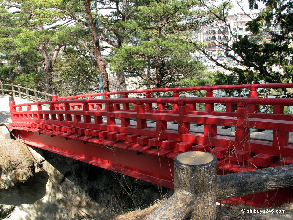Red colored bridges are a beautiful feature of Japanese gardens.