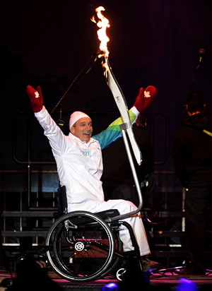 Rick Hansen with the olympic torch