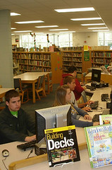 Students using the computers for research by Greentown Public Library