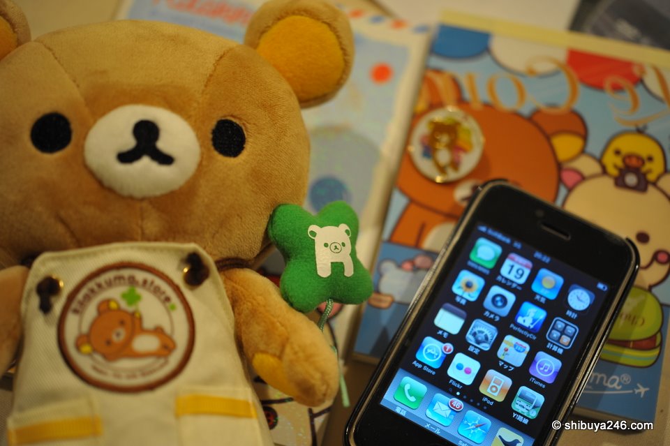 Rilakkuma with mobile phone. Looks there are a few mails to be answered there as well.