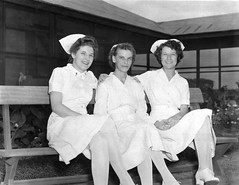 World War II nurses holding hands
