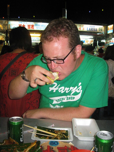 Tasting the piece of durian