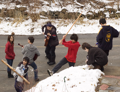 The kids having a combination concert and snow ball fight