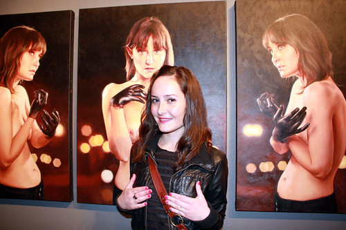 Model with her portraits