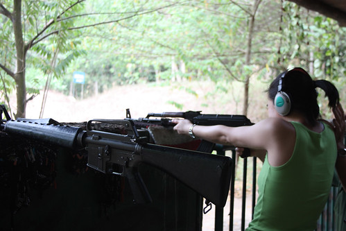 Rina shooting an AK47