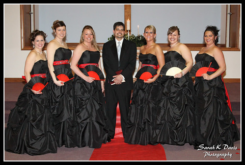 Bridesmaids with pastor