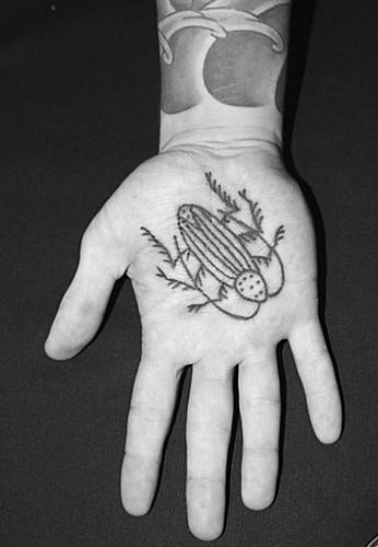 Jordan's palm tattoo by JezzaVonKeys