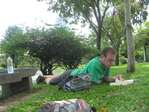 Relaxing and reading in the park
