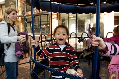 Benjamin Having a Grand Time on the Carousel