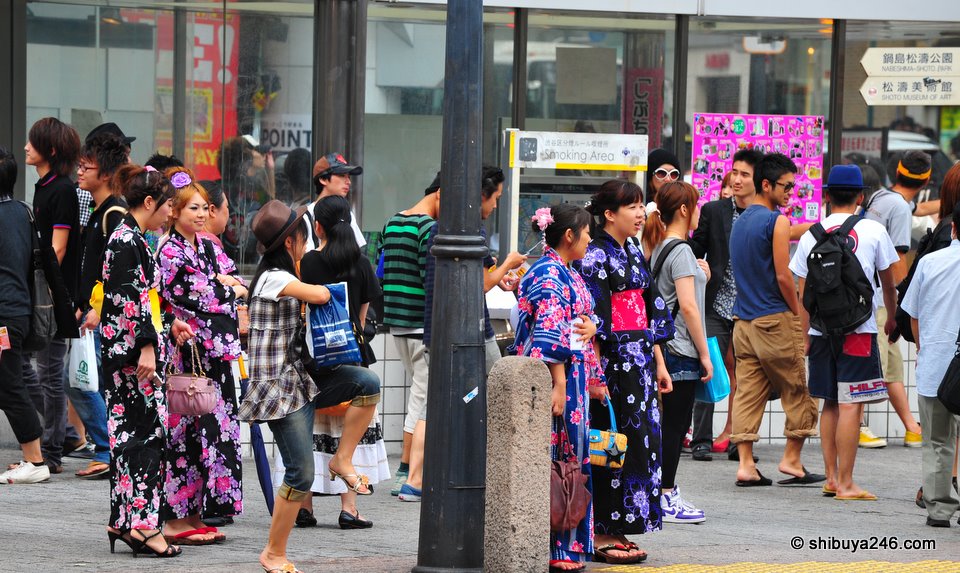 Plenty of girls wearing Yukata at the moment. Probably they are on the way to a fireworks display