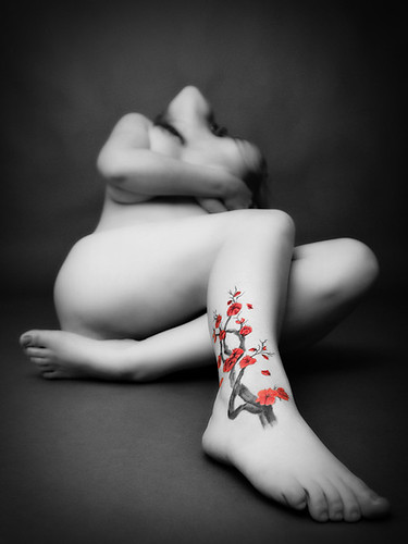 pretty flower tattoos on foot. Flower foot. The model showing her lovely japanese flower tattoo.