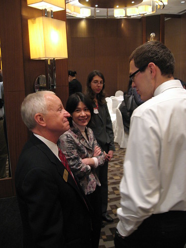 Ballard Metcalfe shares with WKU representative Rick Dubois and other guests at the WKU-sponsored reception.