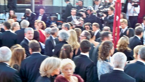 A blurry Steve Jobs on the red carpet