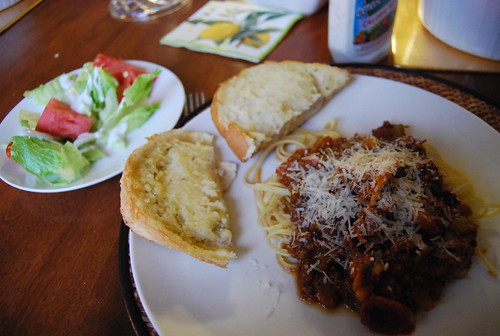 Spaghetti and garlic bread with salad