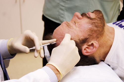 anuary 26, 2010 - Dr. Roger Allcroft administers botox into the forehead of his patient, Dr. John Harris at his medical practice in Northampton. 