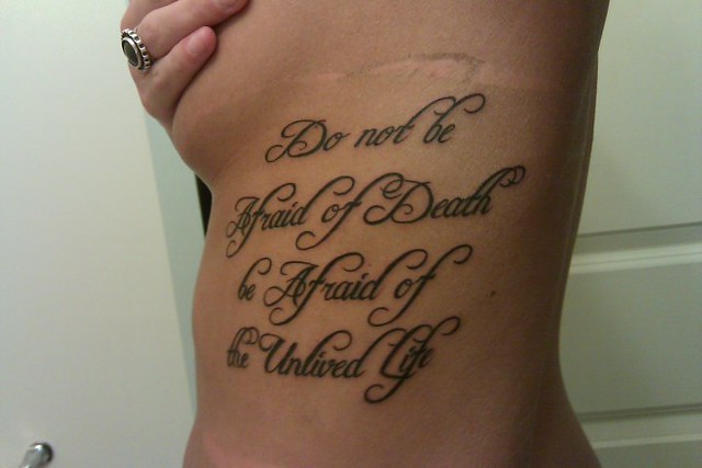Sarah LaBrie's rib tattoo " do not be afraid of death, be aftraid of the 
