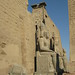 Temple of Luxor, giant seated statue of Ramses II in front of the first pylon (3) by Prof. Mortel
