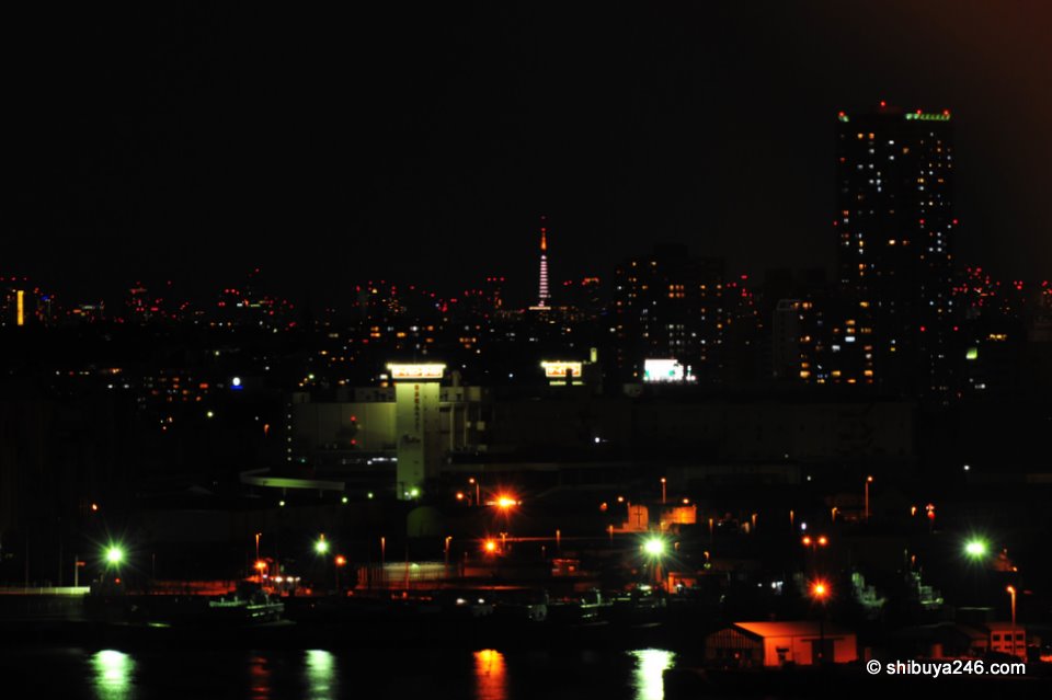 A view of Tokyo Tower and the red dots of Tokyo buildings, from the hotel window.