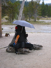 At some point I wheeled around to discover that Tim had used his umbrella to protect his pack from geyser mist.  Another innovative use for off-the-street technology.