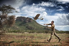 A soldier launches a Desert Hawk, Unmanned Aer...