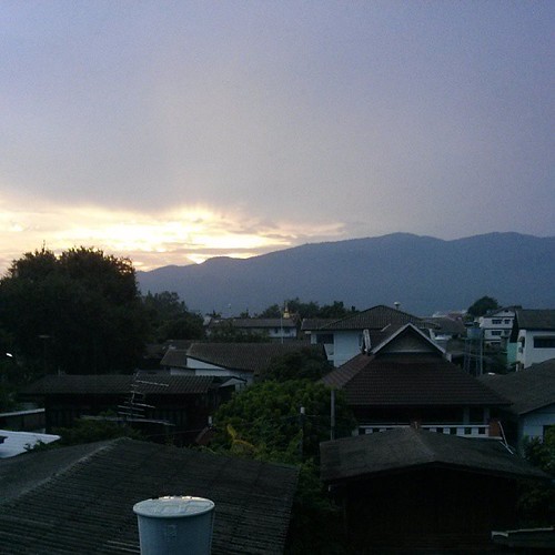 Twilight sun over Doi Suthep, from my room on Sripoom soi 1., © benhourigan