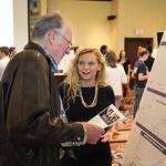 Student shares her Public Relations poster presentation.