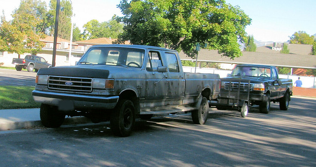 old ford metal truck rust 4x4 gray rusty pickup pickuptruck dent used rusted ugly oxidation trailer 1980s 1990s dents jalopy beatup junker beater madeinusa americanmade fourwheeldrive dented oxidized fomoco worktruck 4door farmtruck crewcab fseries 34ton utilitytrailer eyellgeteven