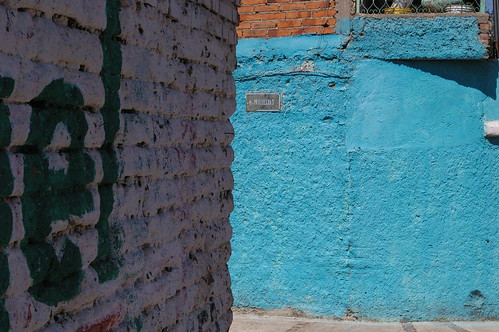 Flash, It's an old adobe wall with colourful paint. Not really illustrative but decorative. 
