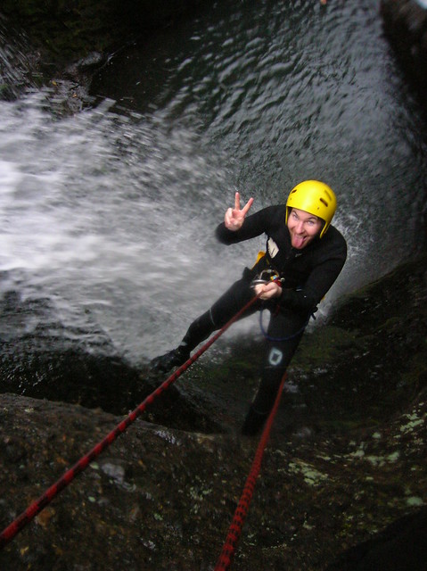 Abseiling down a waterfall