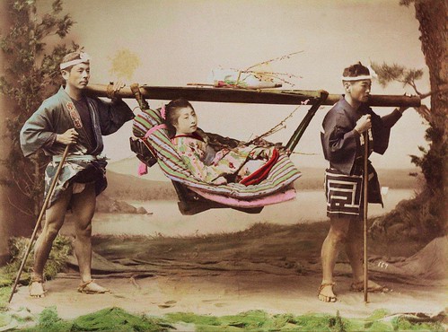 COOLIES CARRY GEISHA IN A KAGO -- The Mountain Taxi of Old Japan