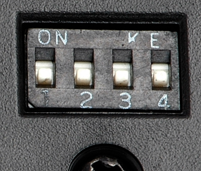Cheap paint job on the lettering for channel selector switches